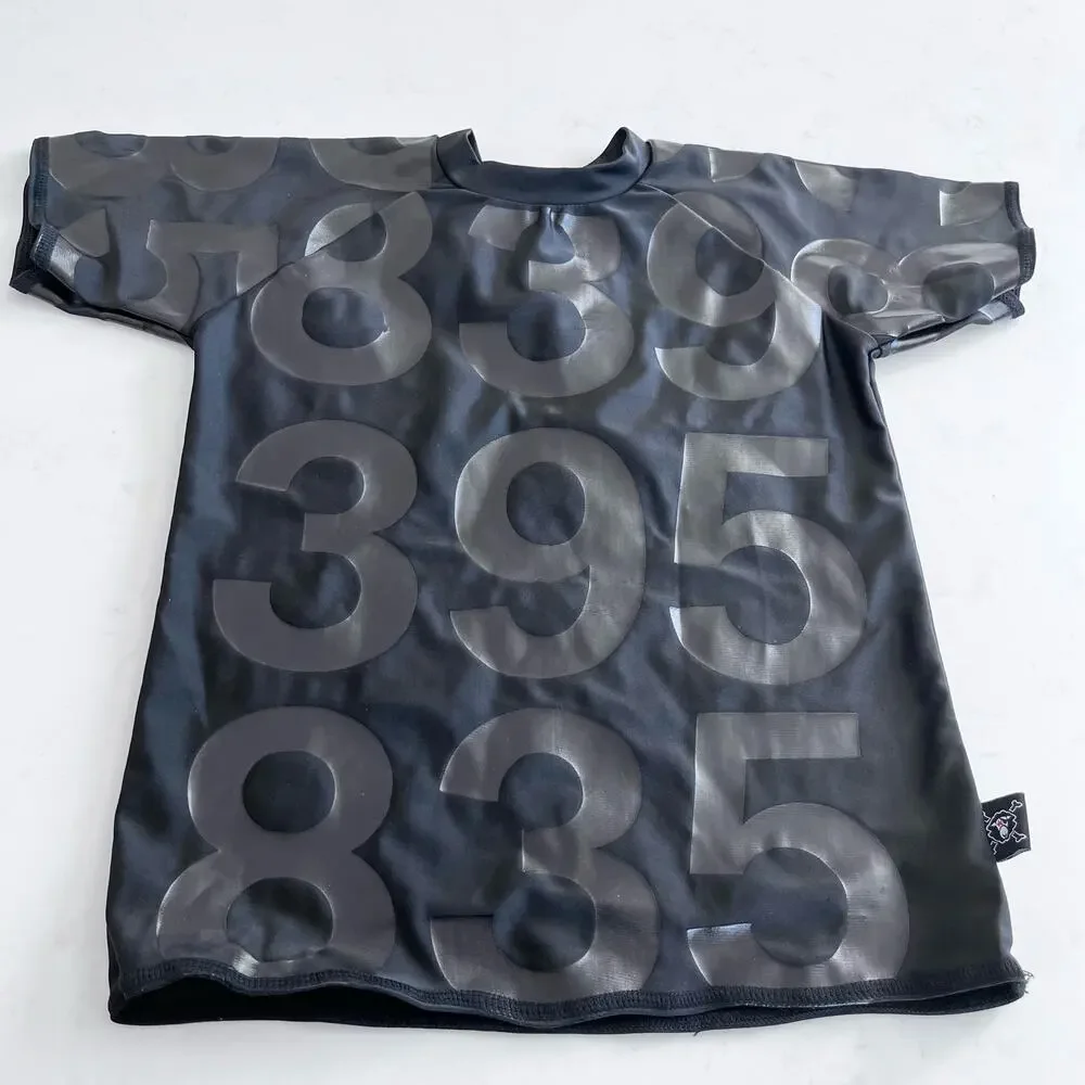 Nununu black unisex boy girl numbered rashguard size 6/7